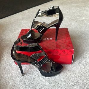 Black and silver strapped Guess heels